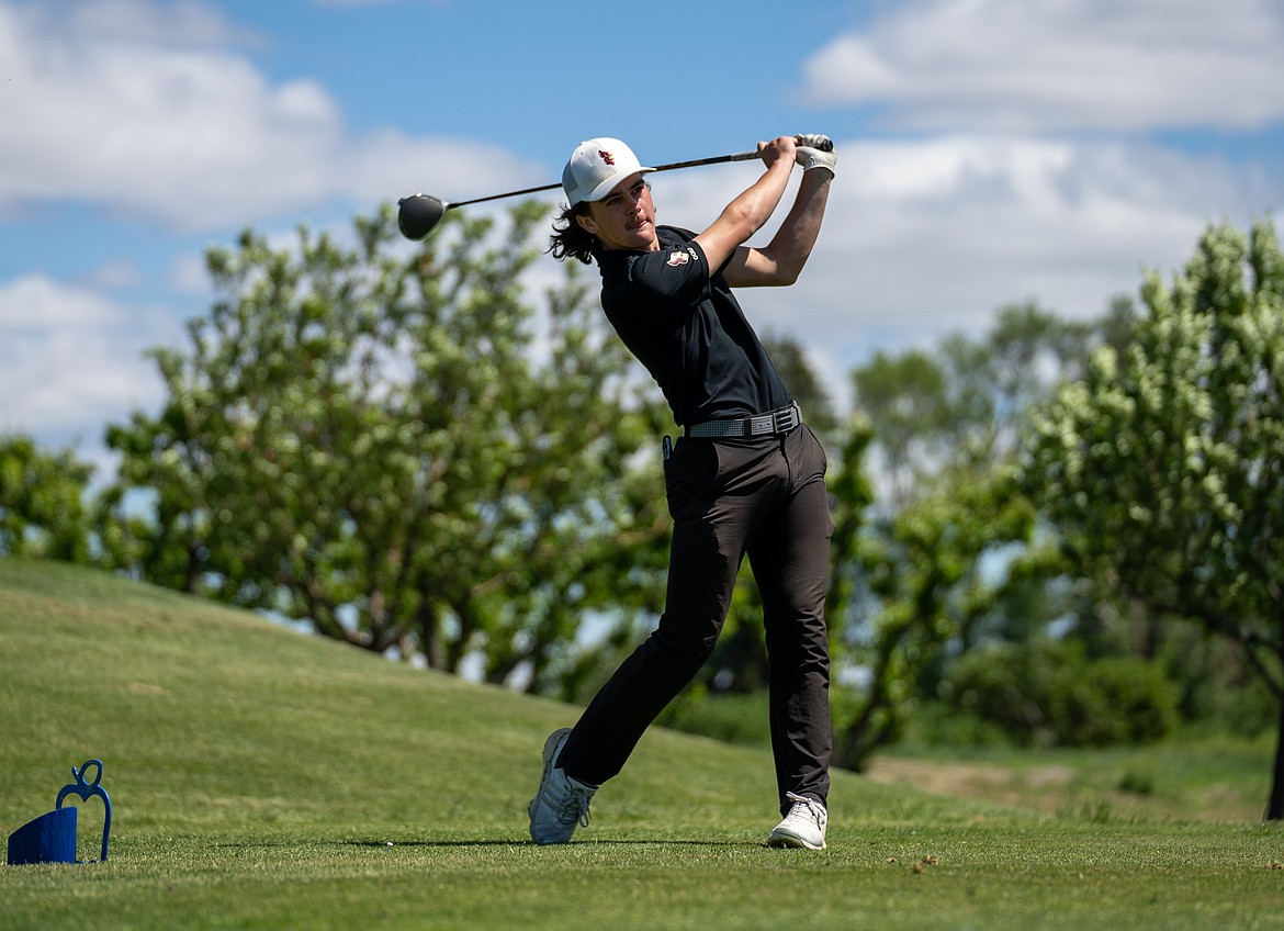 Courtesy NORTH IDAHO COLLEGE
North Idaho College freshman Josh McCartain hits off the first tee Monday at the Northwest Athletic Conference golf championships at Apple Tree Golf Course in Yakima. McCartain was the men's individual champion.