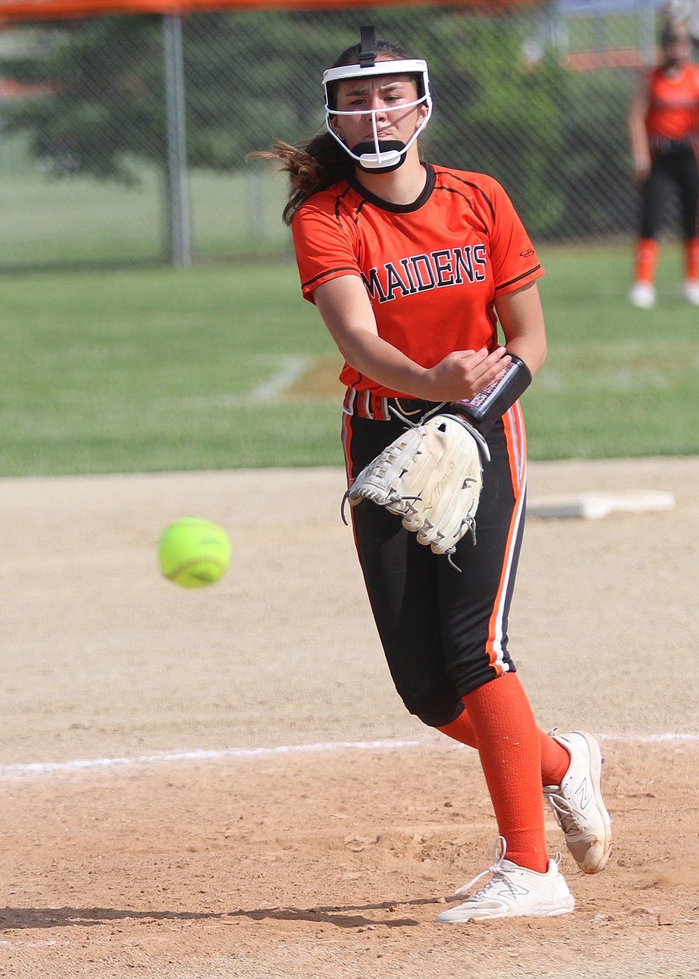 Maiden Kaydance Santos delivers a pitch to Corvallis during the Class A Divisional tourney. (Bob Gunderson photo)