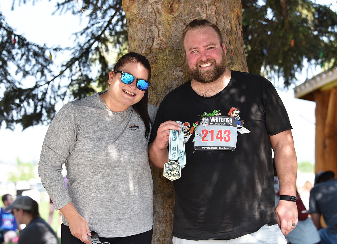 Finishers were all smiles in Depot Park after the Whitefsih Marathon on Saturday. (Julie Engler/Whitefish Pilot)