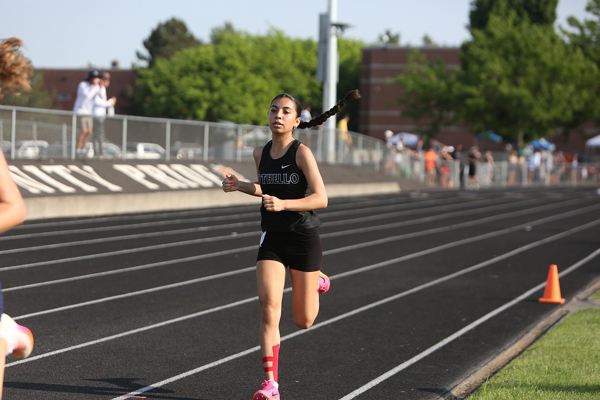 Othello freshman Kimberly Alcaraz runs during the girls 1600-meter event at the CWAC/GSL Regional Championships on Friday.