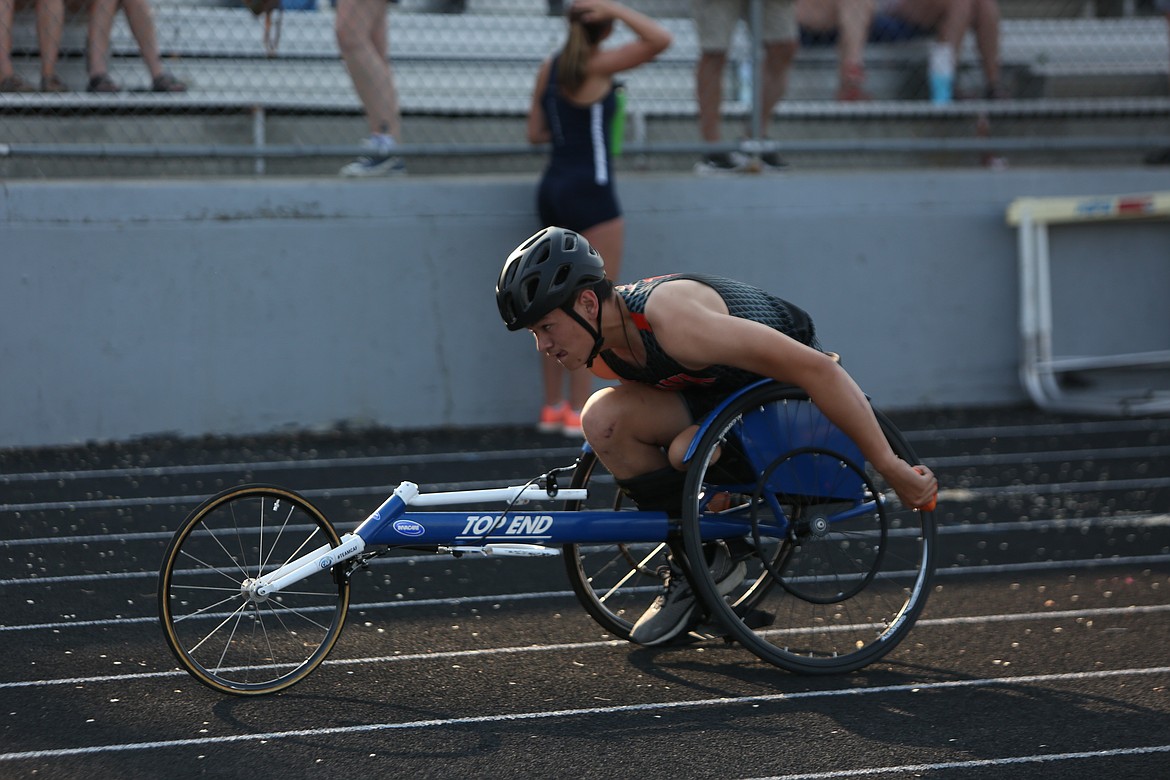 Ephrata junior Benjamin Belino competes during the wheelchair 400-meter race.