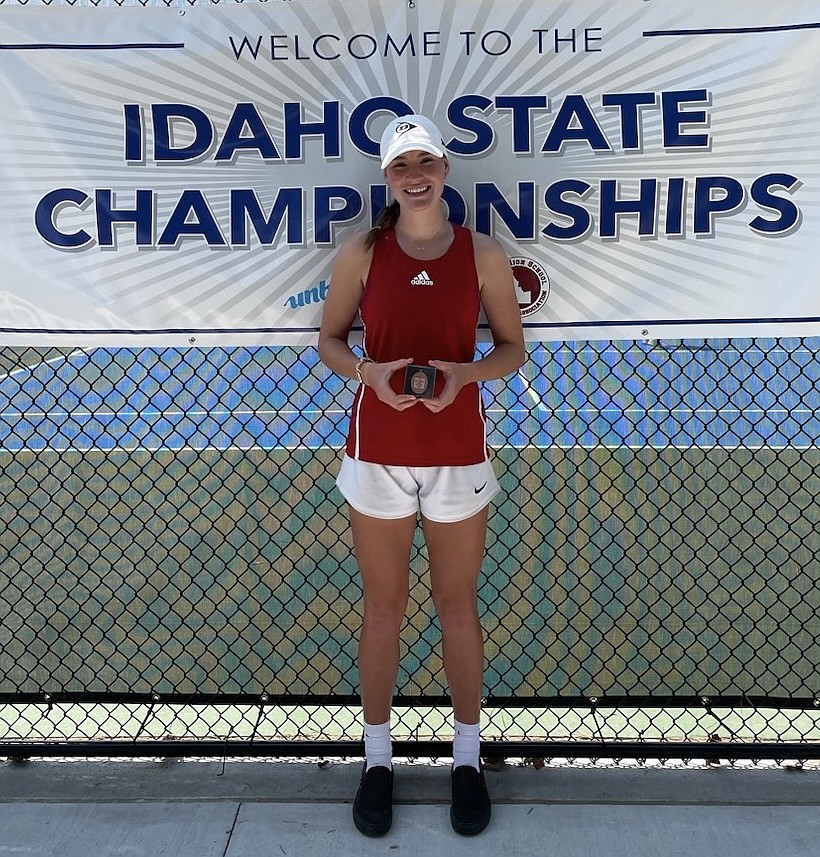 Neva Reseska poses with her fourth-place trophy from the Idaho 4A tennis state championship.