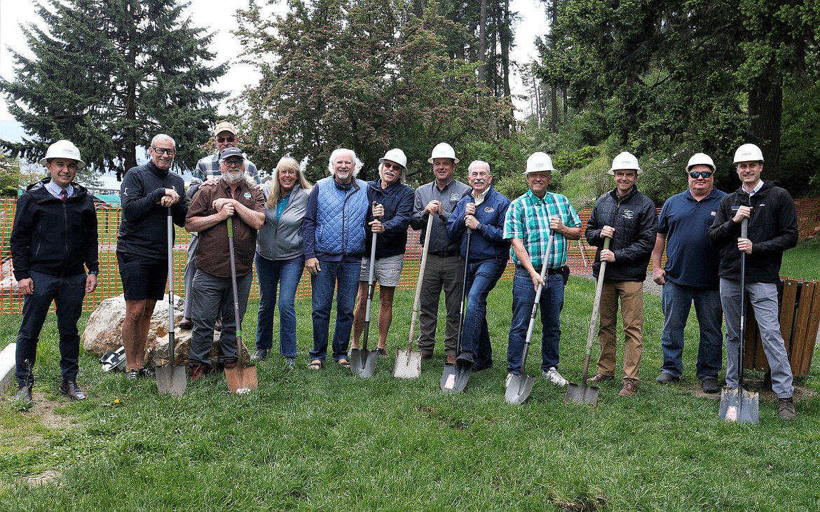 Officials and citizens take part in a groundbreaking for a stormwater outfall volume reduction project on the east side of Tubbs Hill on Monday. From left: Jake Garringer, North Idaho policy adviser, Gov. Brad Little’s Office; Craig Brosenne, CLAC member; Bob Steed, Idaho Department of Environmental Quality; Chris Fillios, CLAC chair; Diana Klybert, community member; Jack Riggs, CLAC vice chair; Coer d'Alene  Councilman Woody McEvers; Todd Feusier, Streets and Engineering Department director; CDA Mayor Jim Hammond, also a CLAC member; Coeur d'Alene Councilman Dan Gookin; Chris Bosley, city engineer; Greg Stewart, Stewart Contracting and Justin Shaw, HMH Engineering.