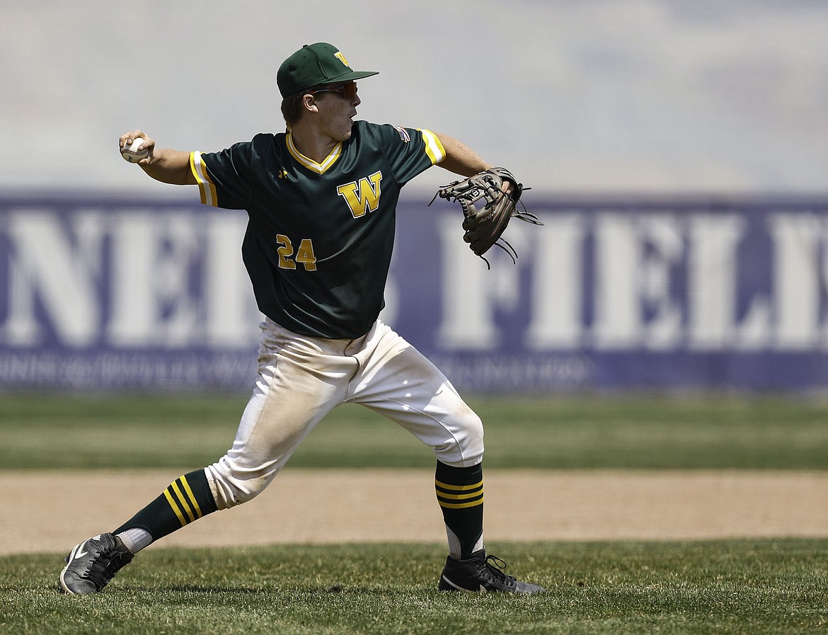 Bulldog Clayton Godsey makes a throw in a game against Hamilton at the State Baseball Tournament in Butte. (Photo by Gary Marshall for 406mtsports.com)