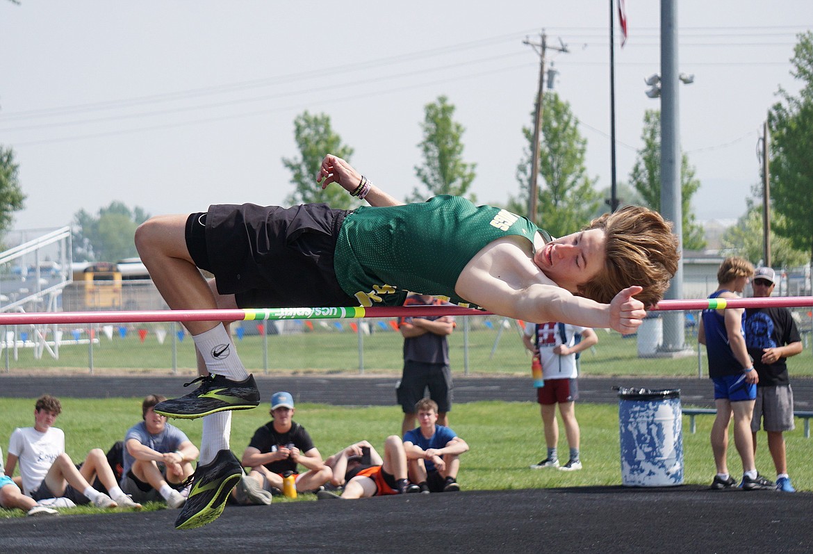 Freshman Cooper Akey, clears 5-04 at the men’s varsity high jump competition on Saturday. (Matt Weller photo)