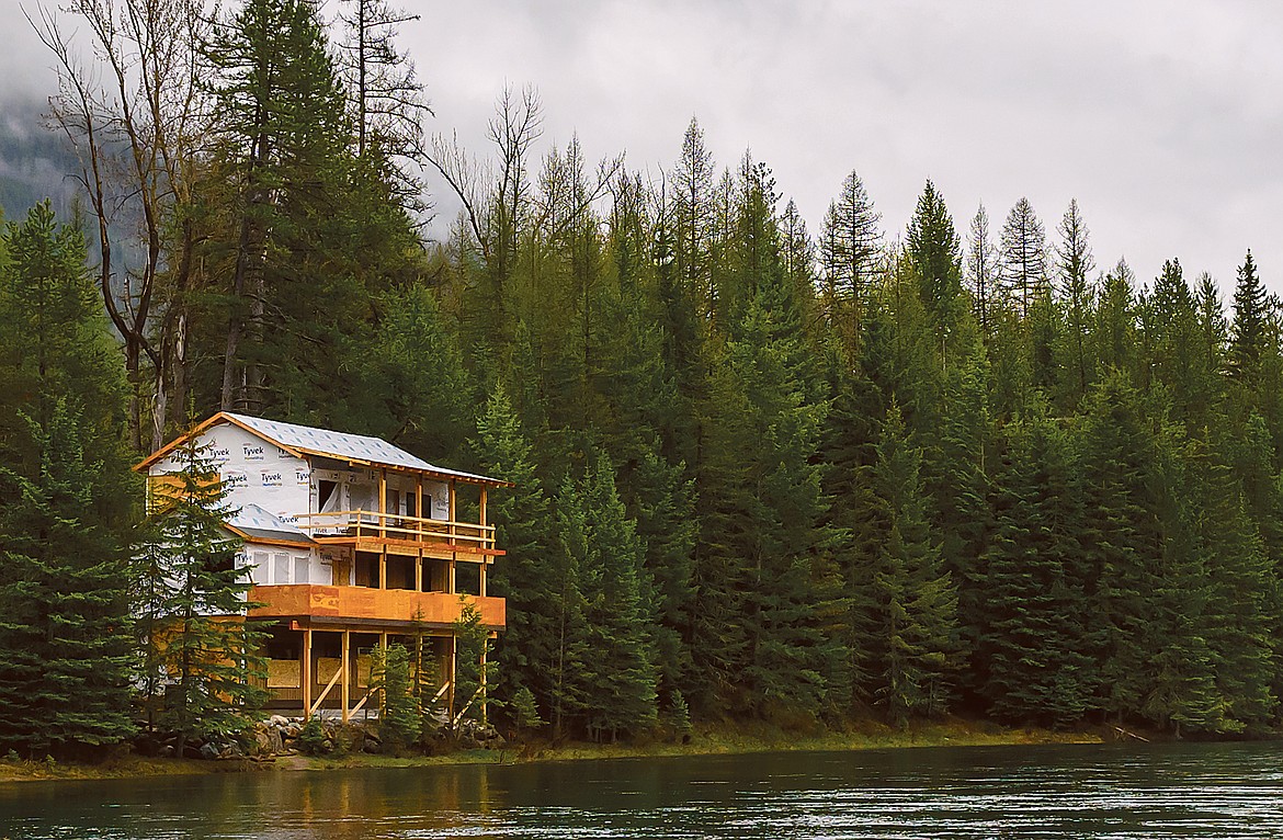 The Ambler home, situated just a few feet from McDonald Creek in Glacier National Park. (Chris Peterson/Hungry Horse News FILE)