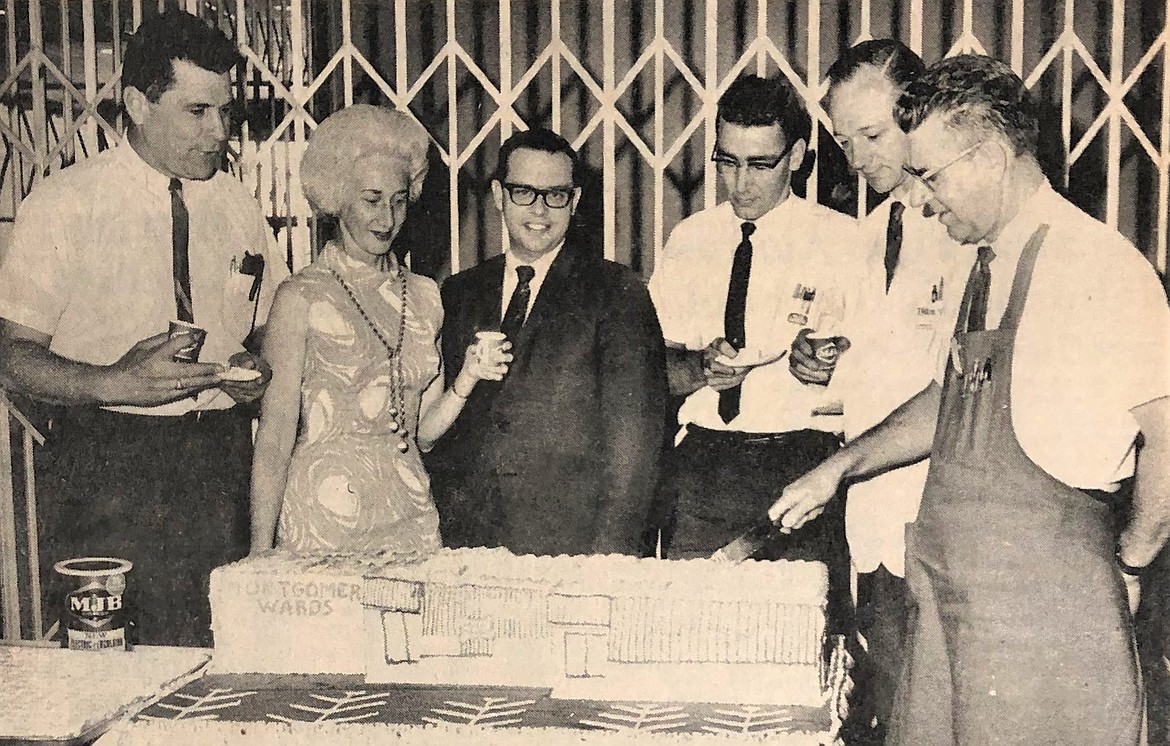 Marie O’Brien at second anniversary of Coeur d’Alene Mall. Others are, from left, Tex Sigler (Mall Furniture), F. Dennis Clark (Montgomery Ward), Jim Pryse (Sprouse Variety), Don Klotz (Klotz Drug) and Jim Howard (Buttreys).