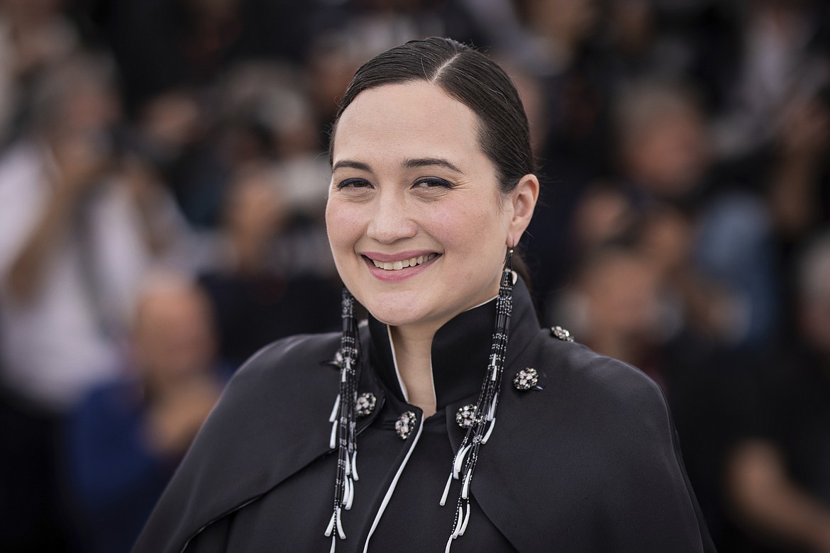 Lily Gladstone poses for photographers at the photo call for the film "Killers of the Flower Moon" at the 76th international film festival, Cannes, southern France, Sunday, May 21, 2023. (Photo by Vianney Le Caer/Invision/AP)