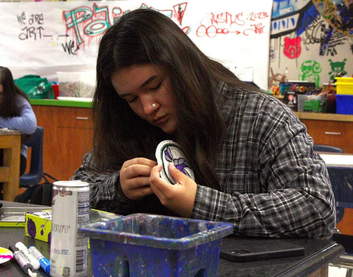 BHFS art student practices embroidery.