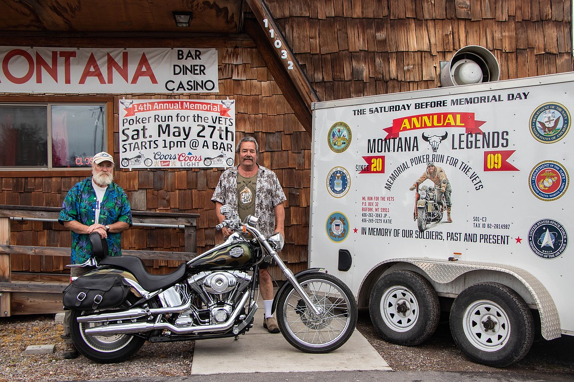 John "JP" Pettigrew, left, and Fella Mulberger, right, members of the Montana Legends, pose for a portrait at the A Bar in Ferndale in the week leading up to the 14th annual Montana Legends Poker Run for the Vets. The featured motorcycle is being auctioned off. (Kate Heston/Daily Inter Lake)
