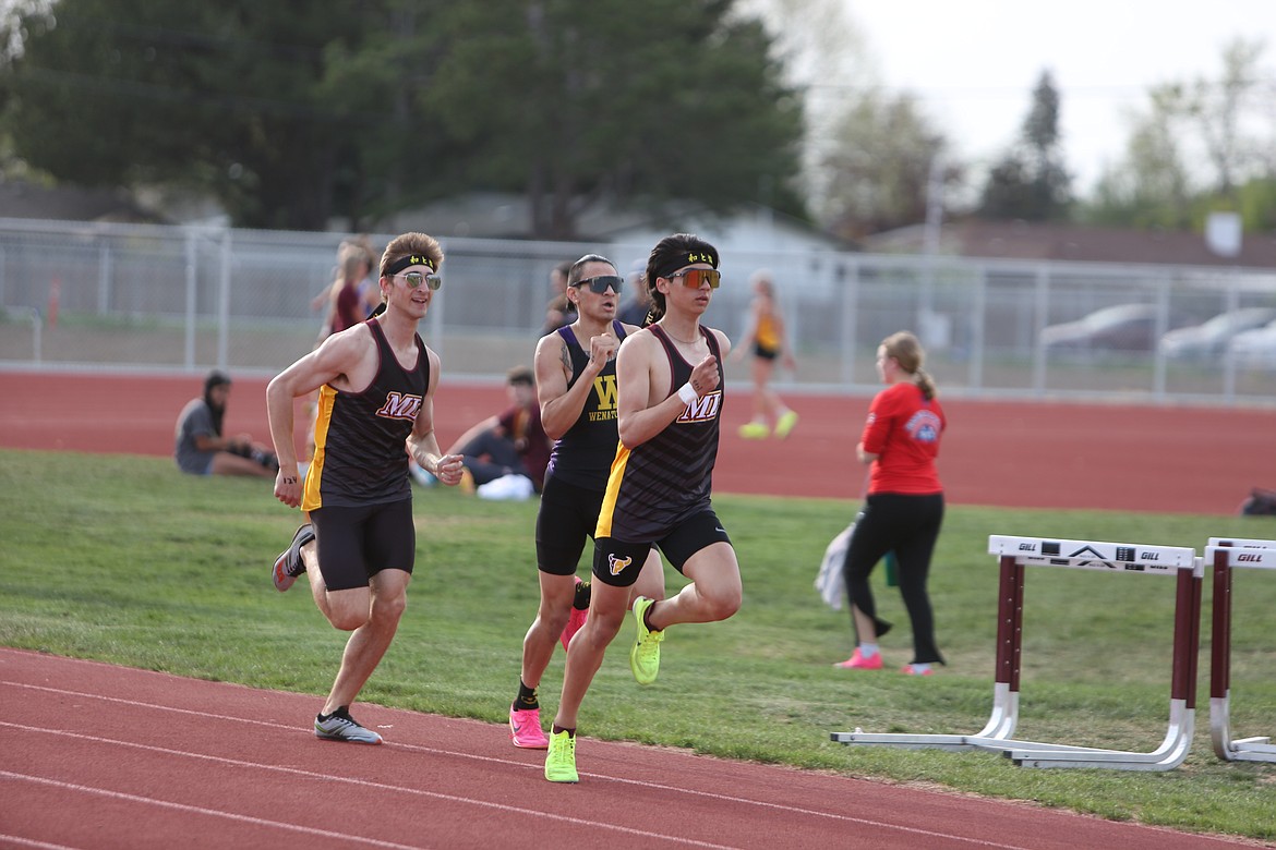 Moses Lake’s Niko Rimple, right, and Logan LaBonte, left, will both run in the Mavs’ boys 4x400-meter relay at the 4A State Track and Field Championships at Mount Tahoma High School.