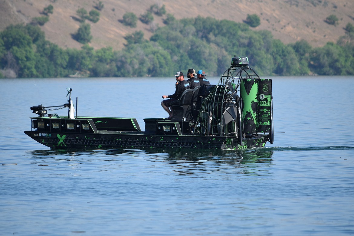 A team of carp shooters in a fan boat, which looks like it would be more at home in the bayous of Louisiana or the Florida Everglades, return from a day of carp shooting during the Moses Lake Carp Classic on Saturday, May 20. “That boat’s loud,” said tournament organizer Ty Swartout.