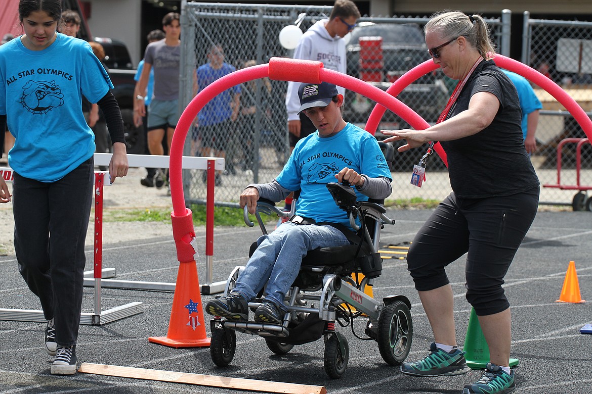 An athlete makes his way through the obstacle course.