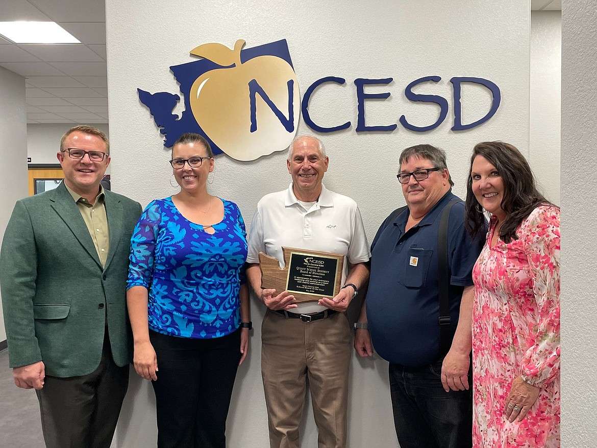 North Central Education Service District Superintendent Michelle Price, right, presents the ESD’s Board of the Year award to, from left, Quincy Superintendent Nik Bergman and board members Heather Folks-Lambert, Chris Baumgartner and Jack Foglesong.