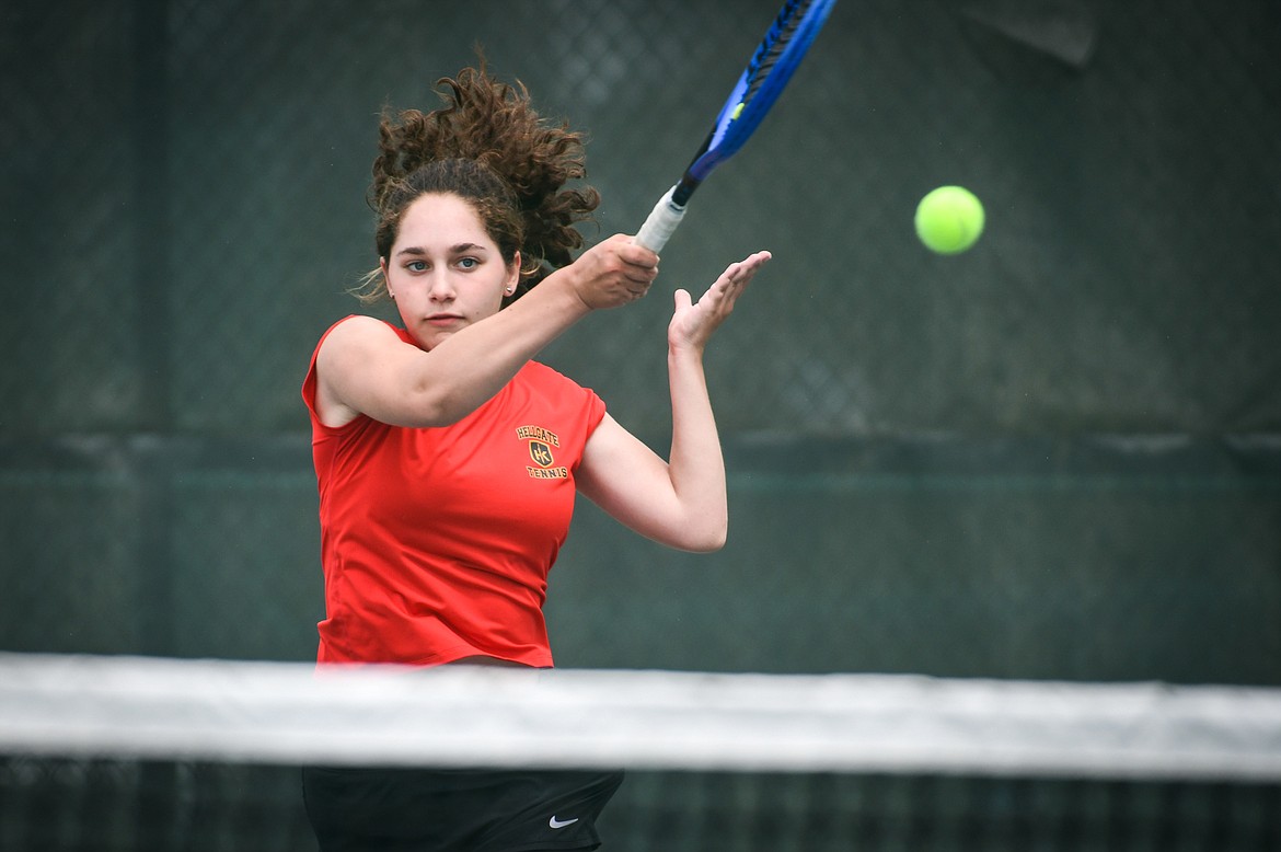 Missoula Hellgate's Elliotte Banziger hits a return in the State AA girls singles championship match against Helena's Qayl Kujala at Flathead Valley Community College on Friday, May 26. (Casey Kreider/Daily Inter Lake)