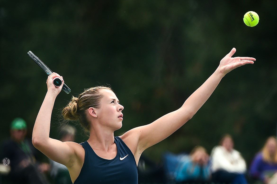 Glacier's Sarah Downs serves in the State AA girls doubles championship match with teammate Haven Speer against Missoula Hellgate's Laine Banziger and Brooke Best at Flathead Valley Community College on Friday, May 26. (Casey Kreider/Daily Inter Lake)