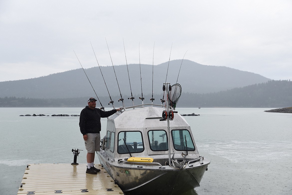 An angler waits for his fishing partner to bring the truck to the dock to trailer their boat during the Lake Koocanusa Fishing Derby on the weekend of May 20-21. (Scott Shindledecker/The Western News)