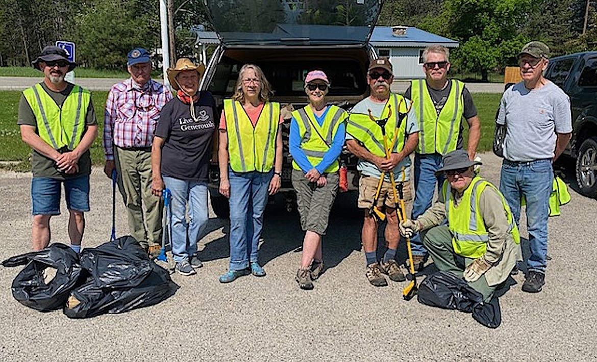 Members of St. John Lutheran Church recently completed their semi-annual highway cleanup of their adopted 2-mile stretch of Farm to Market Road, just outside of Libby. Members participating in the cleanup Saturday, May 20 include, from left, George Steffenson, George Jamison, MaryLou Goodpaster, Julie Foote, Nancy Rooney, Mike Rooney, Tim Grotjohn, Dan Howard (kneeling) and Butch Foote. St. John Lutheran Church cleans their adopted stretch of highway, which is registered with the state, twice a year - once in the spring and again in the fall. (Photo courtesy Alan Lewis Gerstenecker)