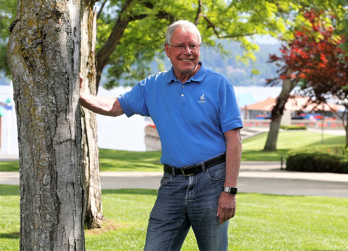 Bill Daniel, posing here near McEuen Park on Friday, aims to run his 100th half marathon in Coeur d'Alene on Sunday.