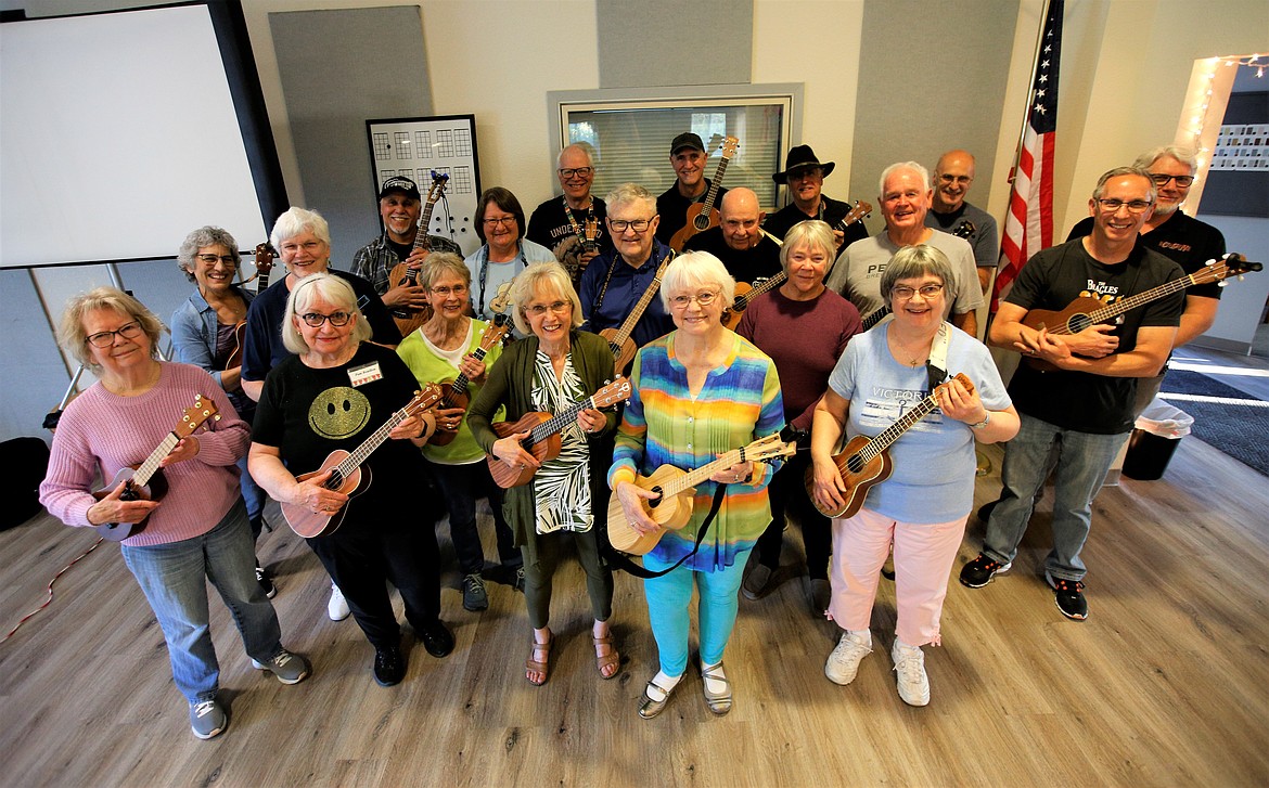 Members of the Ukulele Club of Coeur d'Alene pose for a photo.