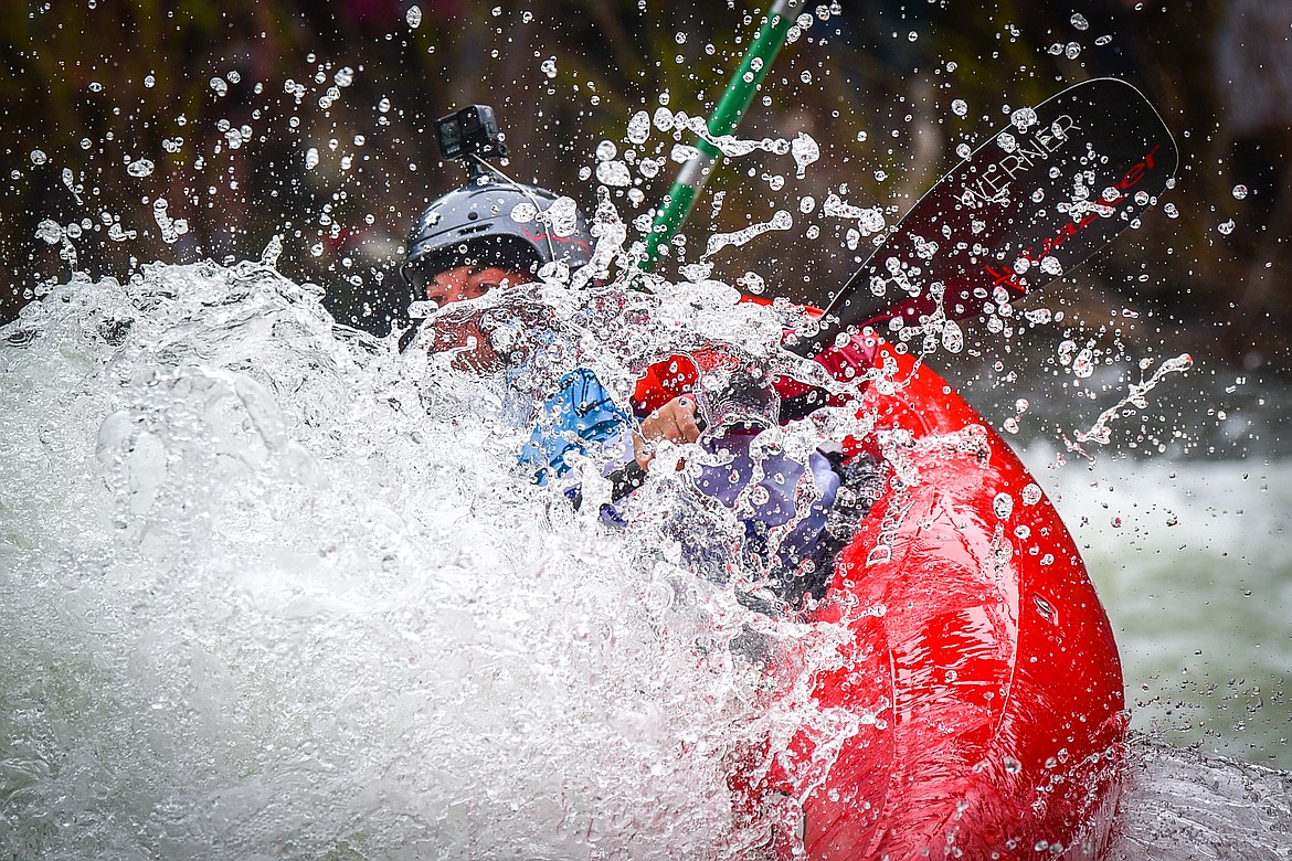 A kayaker navigates a section of the Wild Mile along the Swan River during the Expert Slalom event at the 48th annual Bigfork Whitewater Festival on Saturday, May 27. (Casey Kreider/Daily Inter Lake)