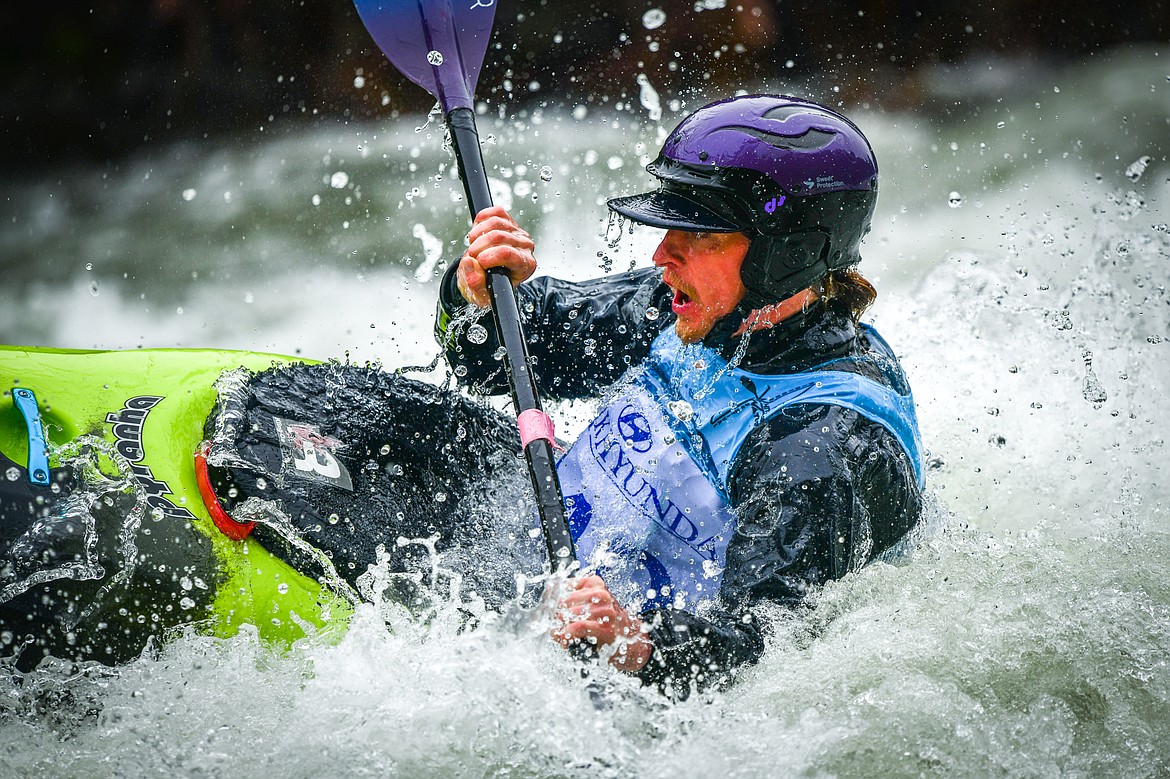 A kayaker navigates a section of the Wild Mile along the Swan River during the Expert Slalom event at the 48th annual Bigfork Whitewater Festival on Saturday, May 27. (Casey Kreider/Daily Inter Lake)