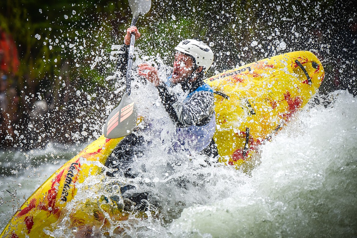 A kayaker navigates a section of the Wild Mile along the Swan River during the Expert Slalom event at the 48th annual Bigfork Whitewater Festival on Saturday, May 27. (Casey Kreider/Daily Inter Lake)