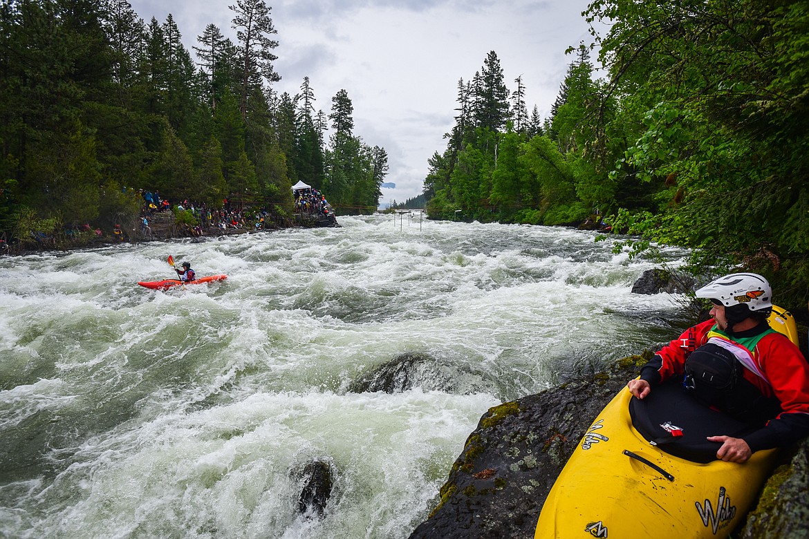 A kayaker navigates a section of the Wild Mile along the Swan River during the Expert Slalom event at the 48th annual Bigfork Whitewater Festival on Saturday, May 27. (Casey Kreider/Daily Inter Lake)