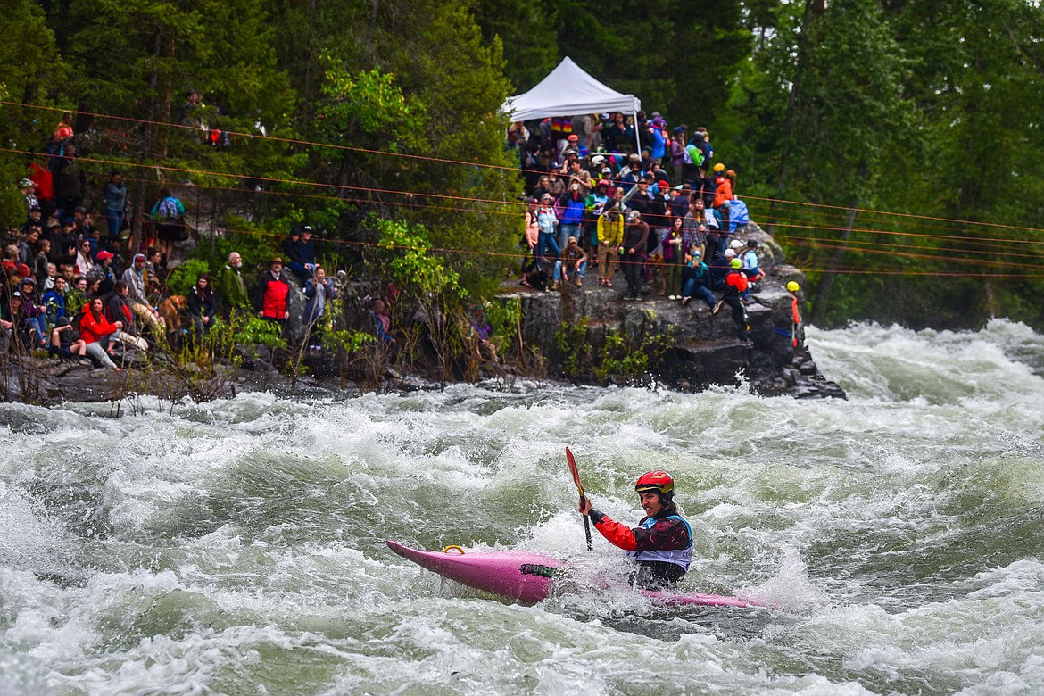 A kayaker navigates a section of the Wild Mile along the Swan River during the Expert Slalom event at the 48th annual Bigfork Whitewater Festival on Saturday, May 27. (Casey Kreider/Daily Inter Lake)