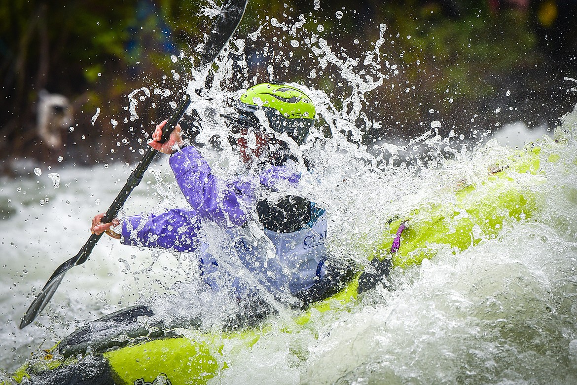 A kayaker navigates a section of the Wild Mile along the Swan River during the Expert Slalom event at the 48th annual Bigfork Whitewater Festival on Saturday, May 27. (Casey Kreider/Daily Inter Lake)