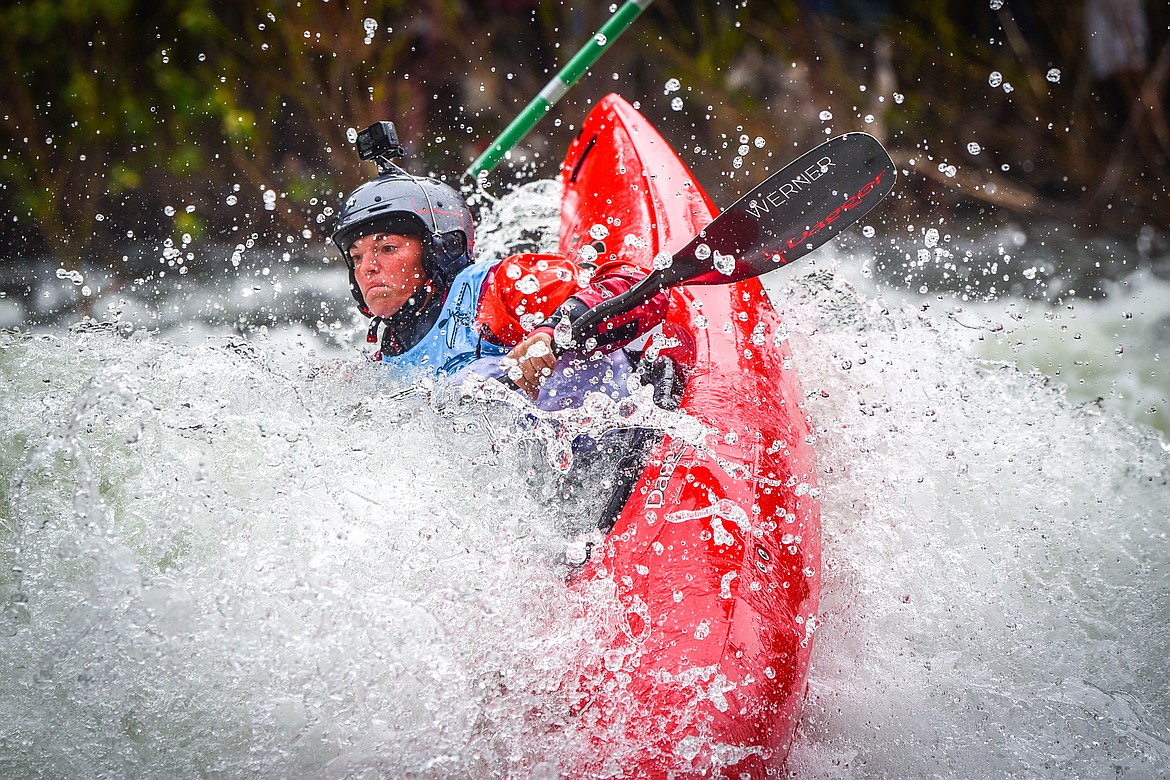 A kayaker navigates a section of the Wild Mile along the Swan River during the Expert Slalom event at the 48th annual Bigfork Whitewater Festival on Saturday, May 27. (Casey Kreider/Daily Inter Lake)