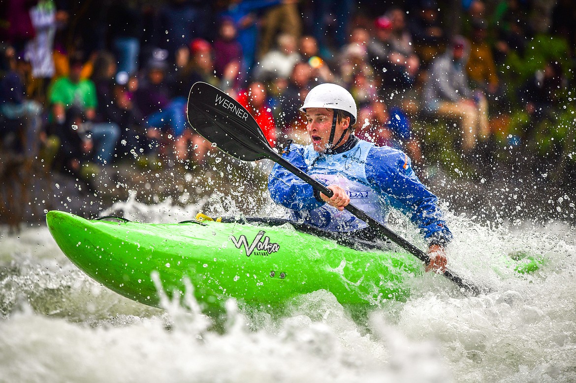 A kayaker navigates a section of the Wild Mile along the Swan River during the Expert Slalom event at the 48th annual Bigfork Whitewater Festival on Saturday, May 27. (Casey Kreider/Daily Inter Lake)