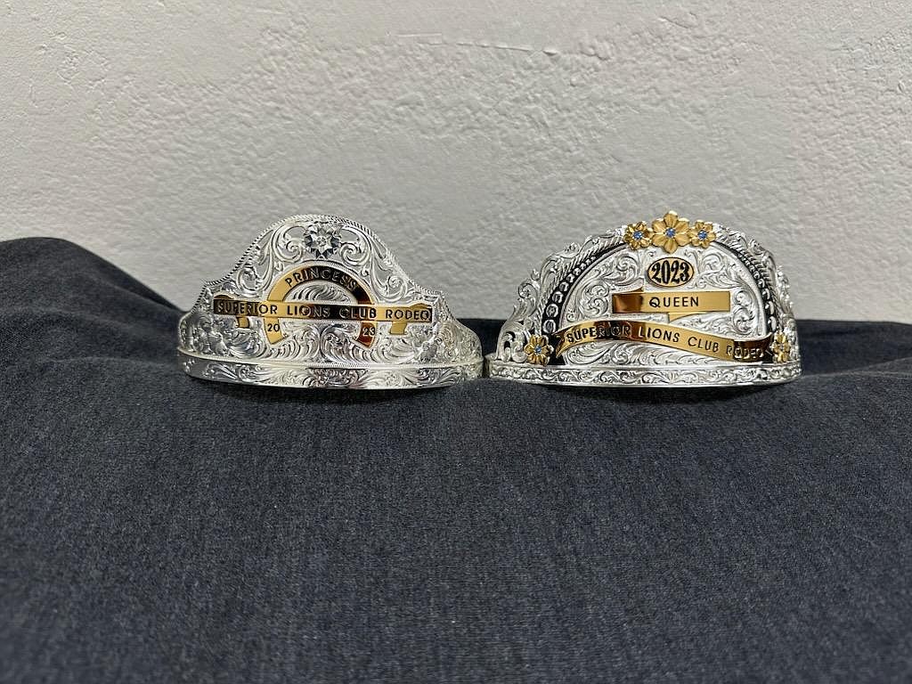 Lincoln’s $50,000 Silver Dollar Bar, Gift Shop and Restaurant in Haugan is again donating the genuine sterling silver tiaras for the Superior LION’s Club Go For The Gold Rodeo during the Mineral County Fair. Applications for the Junior Rodeo Princess are due June 14. (Monte Turner/Mineral Independent)