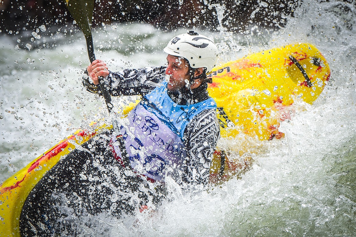 A kayaker navigates a section of the Wild Mile along the Swan River during the Expert Slalom event at the 48th annual Bigfork Whitewater Festival on Saturday, May 27. (Casey Kreider/Daily Inter Lake)