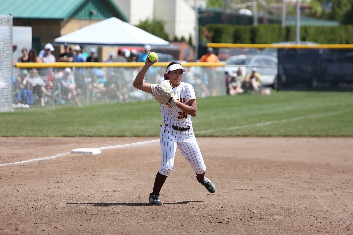 Moses Lake senior Jazlynn Torres gets ready to throw to first base after picking up a ground ball.