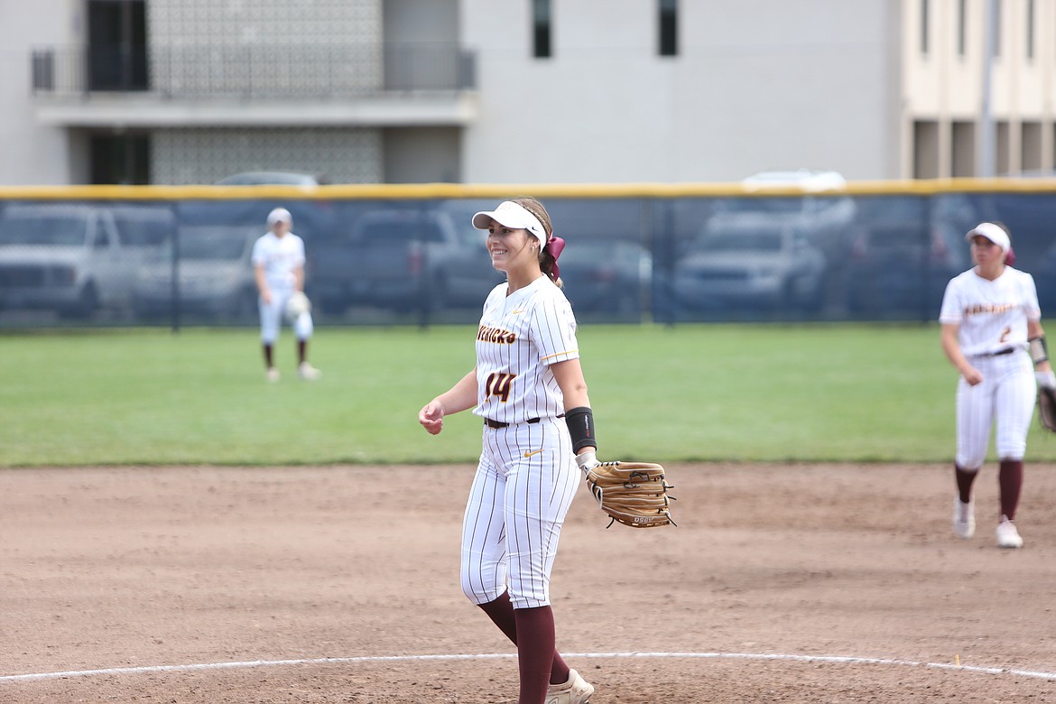 Moses Lake sophomore Paige Richardson smiles after recording a strikeout against Richland on Friday.