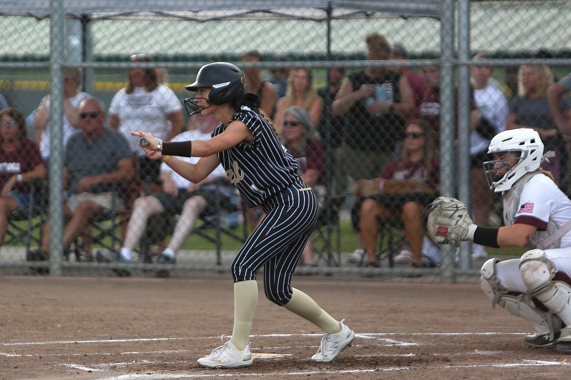 Royal junior Jaya Griffin looks toward the Montesano pitcher during the 1A state championship game on Saturday.