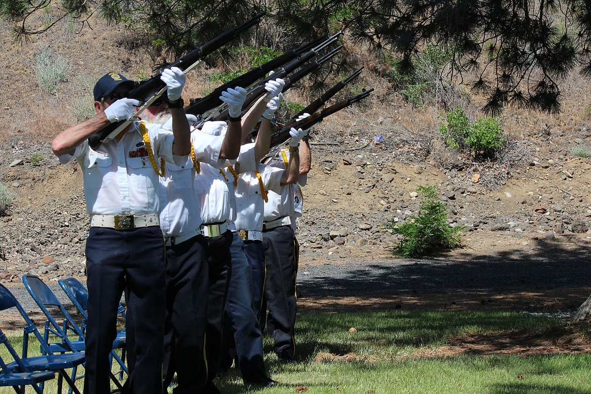 Members of American Legion Post 28 in Ephrata fire a 21-gun salute in honor of the veterans buried at the Ephrata Cemetery during a Memorial Day ceremony Monday. Speaker Mike Montenay said the post has identified 480 military veterans in the cemetery, from all branches of the U.S. armed forces, who fought in conflicts dating back to the Civil War.