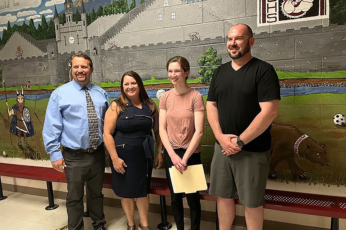 Sandpoint High School Assistant Principal TJ Clary, Sandpoint High School Principal Jacki Crossingham, Elizabeth Couch, and FAS education manager Paul Gunter pose for a photo after the Festival at Sandpoint has granted five local high school and college students scholarships for accomplishments in music, writing, and art.