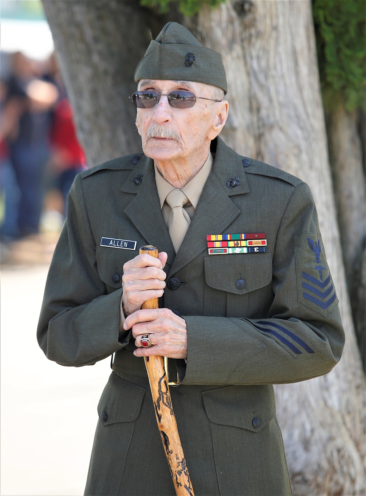 Veteran Bob Allen grips his walking stick at Coeur d'Alene Memorial Gardens on Monday.