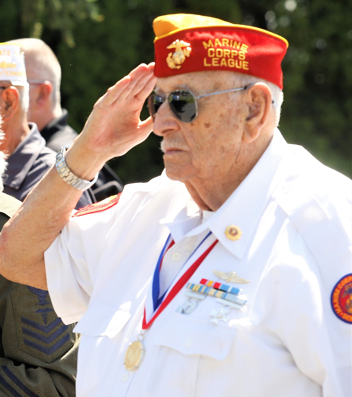 Mac MacCormack salutes during the Memorial Day ceremony at Coeur d'Alene Memorial Gardens.