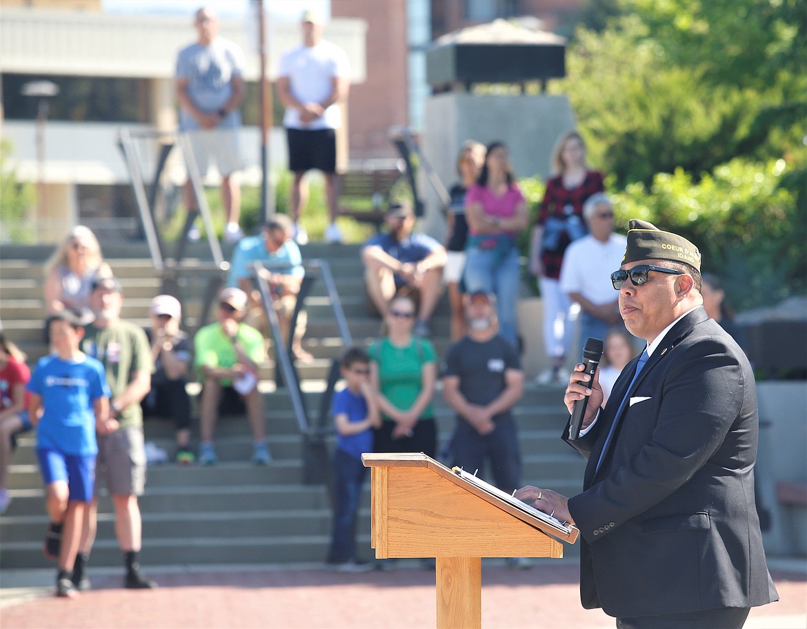 Retired U.S. Army Col. Glen Heape addresses the crowd on Memorial Day at Veterans Plaza.