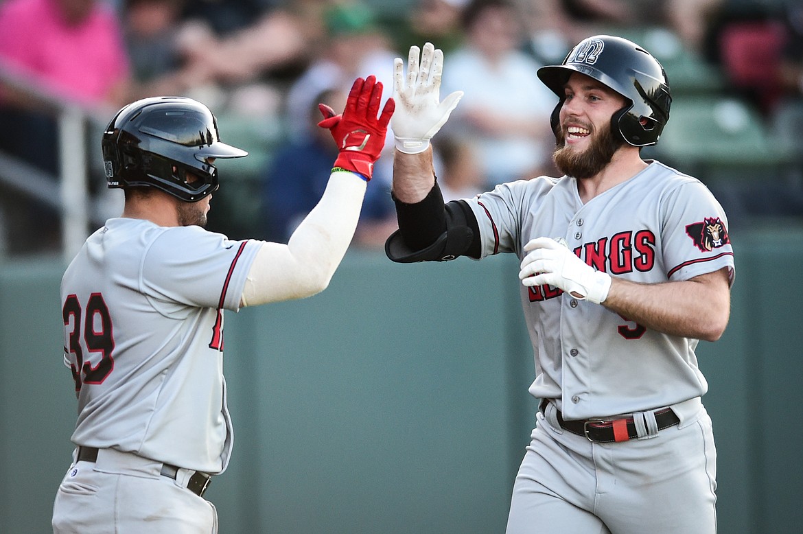 Billings' Connor Denning (9) is congratulated after hitting a home run in the third inning against the Glacier Range Riders at Glacier Bank Park on Tuesday, May 30. (Casey Kreider/Daily Inter Lake)