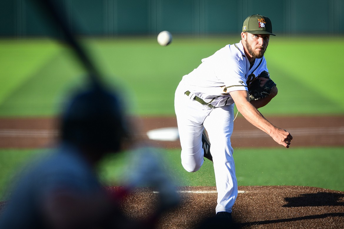 Glacier starting pitcher Tanner Solomon (3) delivers the first pitch in the Range Riders' home opener against the Billings Mustangs on Tuesday, May 30. (Casey Kreider/Daily Inter Lake)