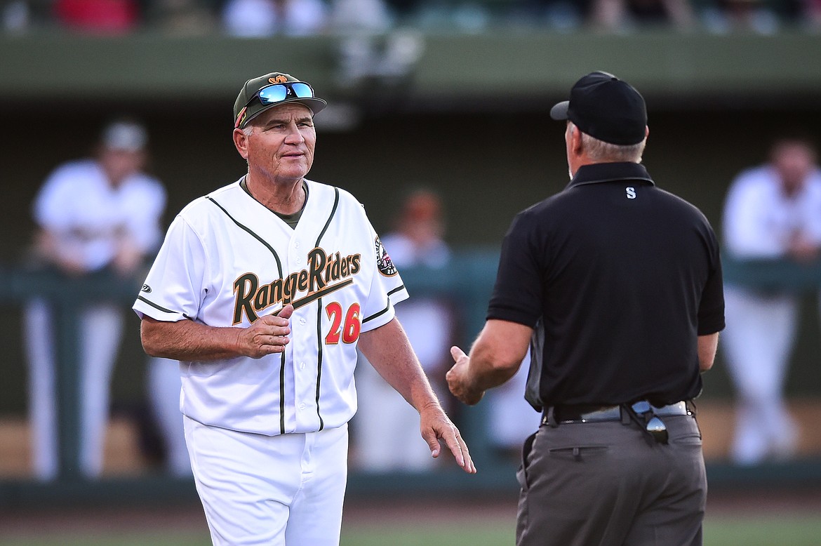 Glacier Range Riders manager Stu Pederson gets an explanation on a call from an umpire against the Billings Mustangs on Tuesday, May 30. (Casey Kreider/Daily Inter Lake)