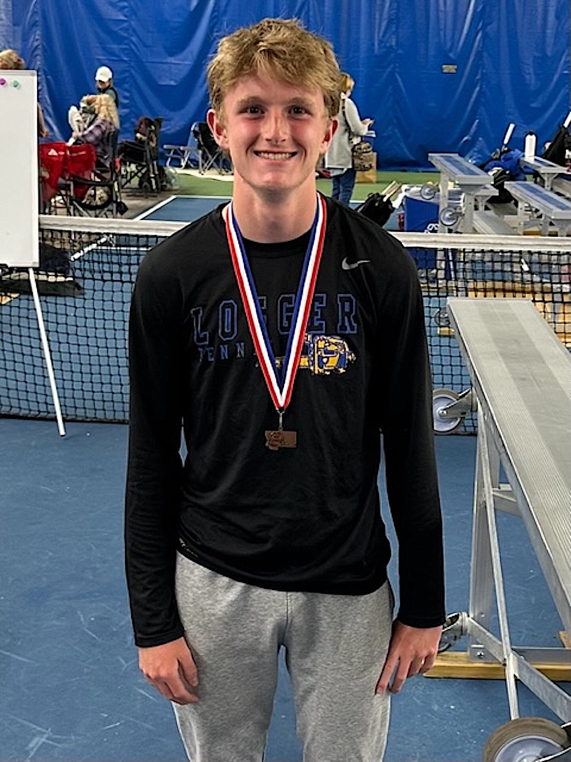 Libby sophomore Ryan Beagle displays his bronze medal for finishing third at the Class A Montana State Tennis Championships on Saturday, May 27 in Missoula.