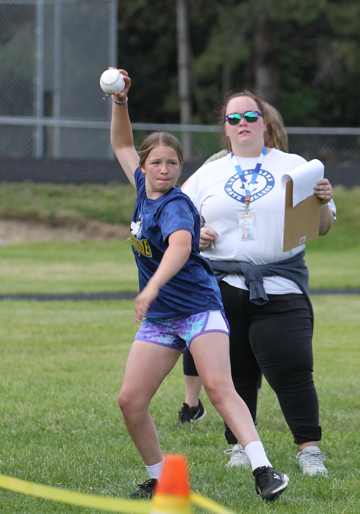 A Northside Elementary School student competes in the softball throw.