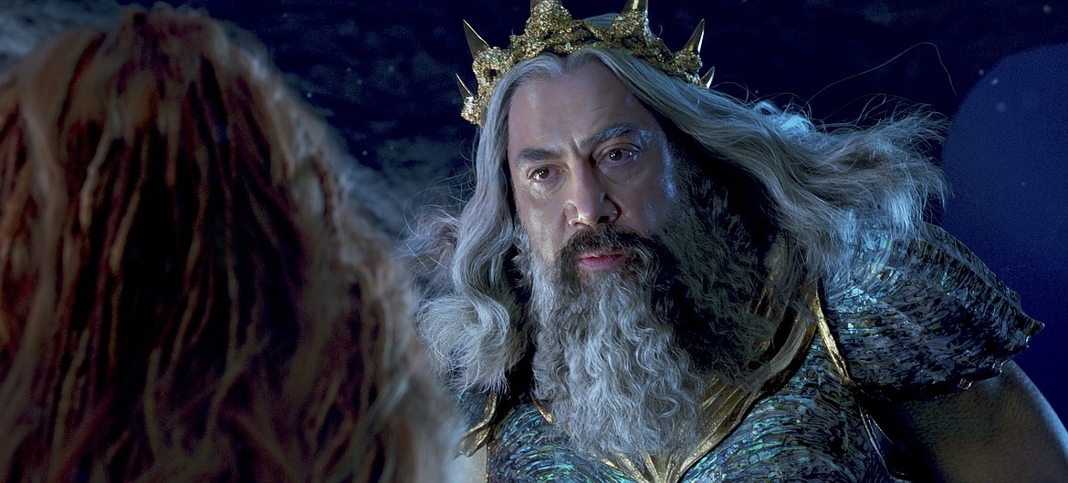 This image released by Disney shows Halle Bailey as Ariel and Javier Bardem as King Triton in "The Little Mermaid."