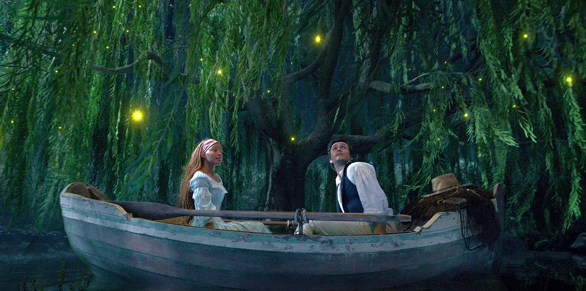 This image released by Disney shows Halle Bailey as Ariel and Jonah Hauer-King as Prince Eric in "The Little Mermaid."