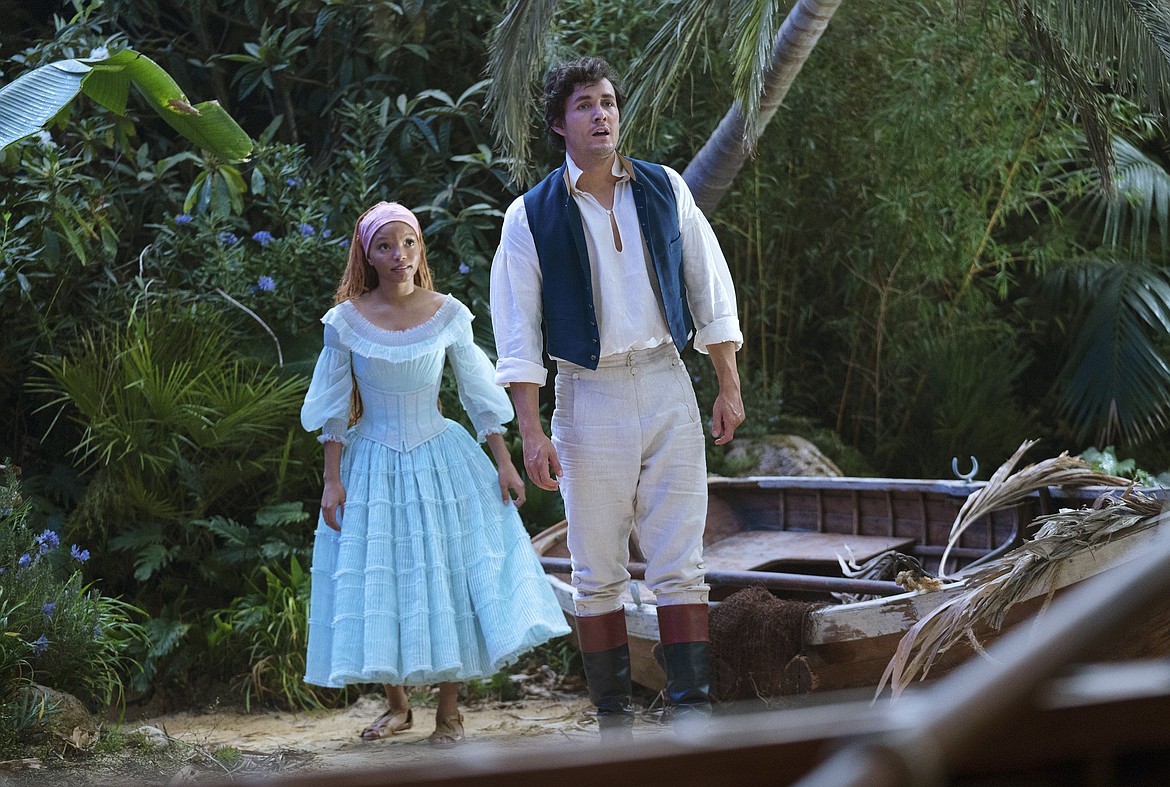 This image released by Disney shows Halle Bailey as Ariel and Jonah Hauer-King as Prince Eric in "The Little Mermaid."